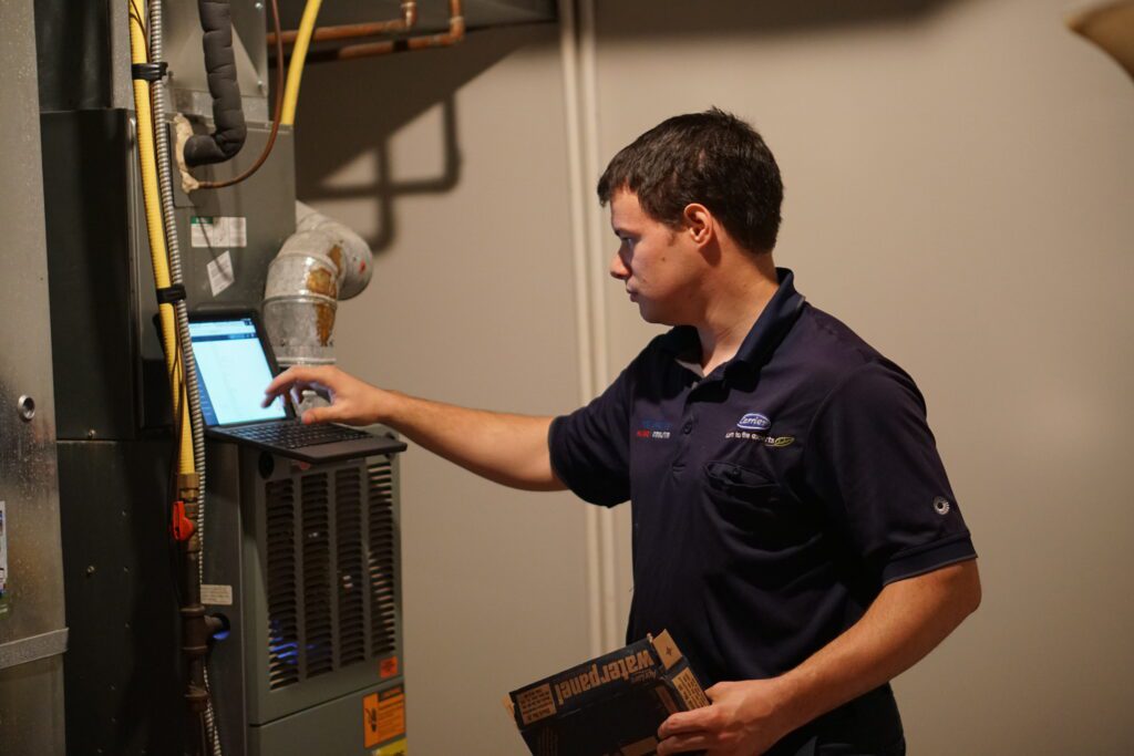 Columbus, Ohio HVAC technician performing a fall furnace tune-up.